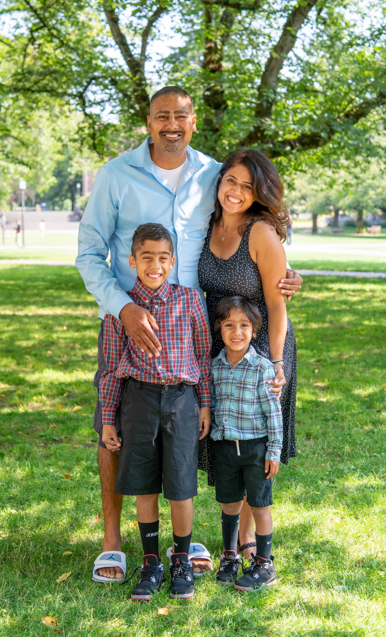 Karim Merchant with his wife and two sons